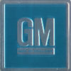 1967 G.M. Emblem W/ Teal Background